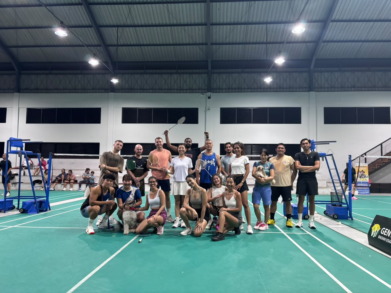 Sailia Badminton players on court at Karmayoga Badminton Center, August 2026