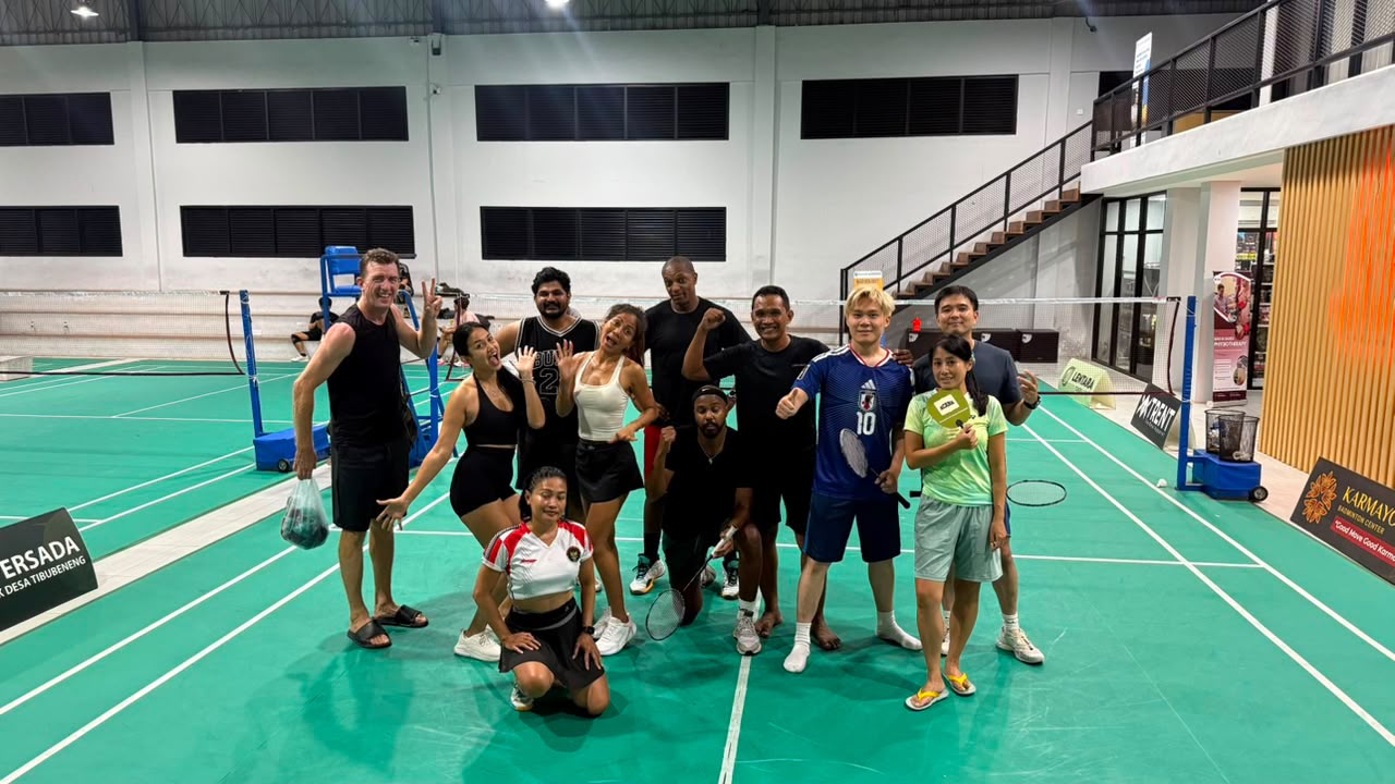 Doubles game in progress at Karmayoga Badminton Center, August 2026
