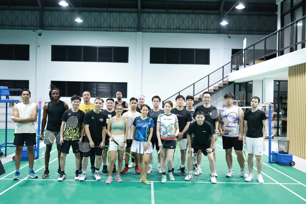 The whole group lined up on court after a Sailia Badminton night, September 2026